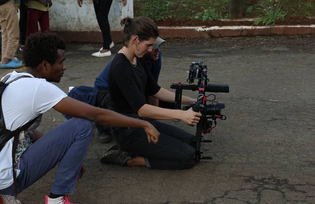 Behind the camera